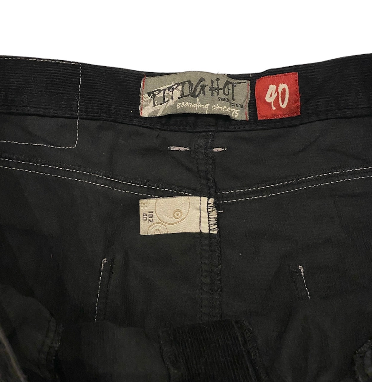 Piping hot embroidered jorts