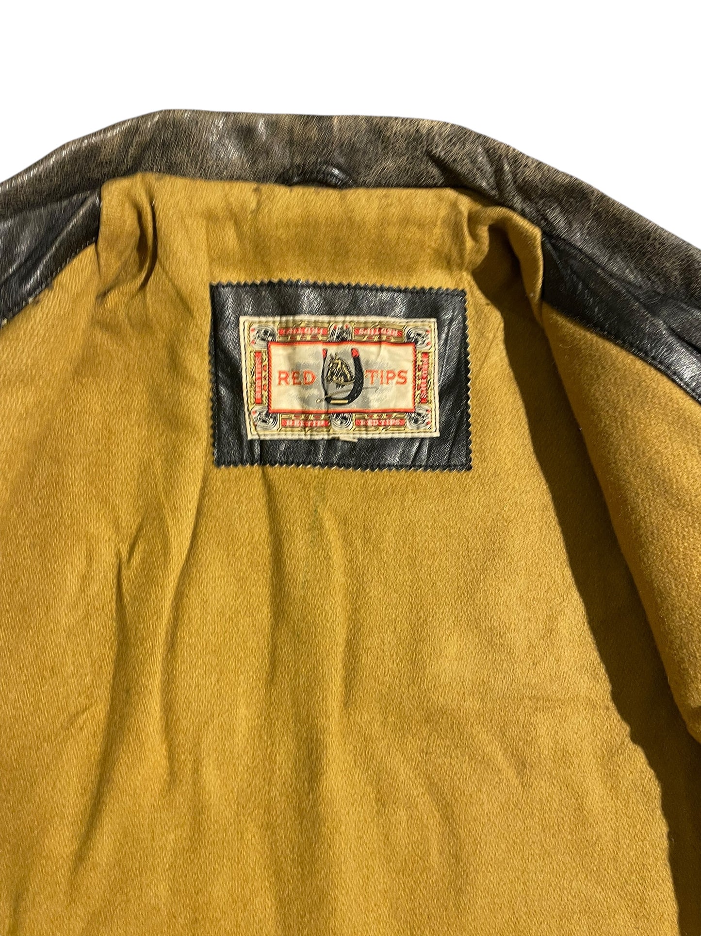 Red tips heavy leather jacket